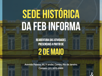Fotografia do prédio da sede histórica da FEB no Rio de Janeiro. À frente da imagem, tem uma caixa transparente com um texto que diz: 